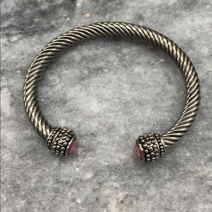 Silver bracelet with pink jewels